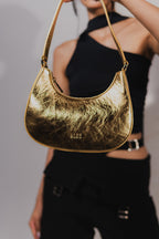 MEDIA LUNA BAG DORADA
