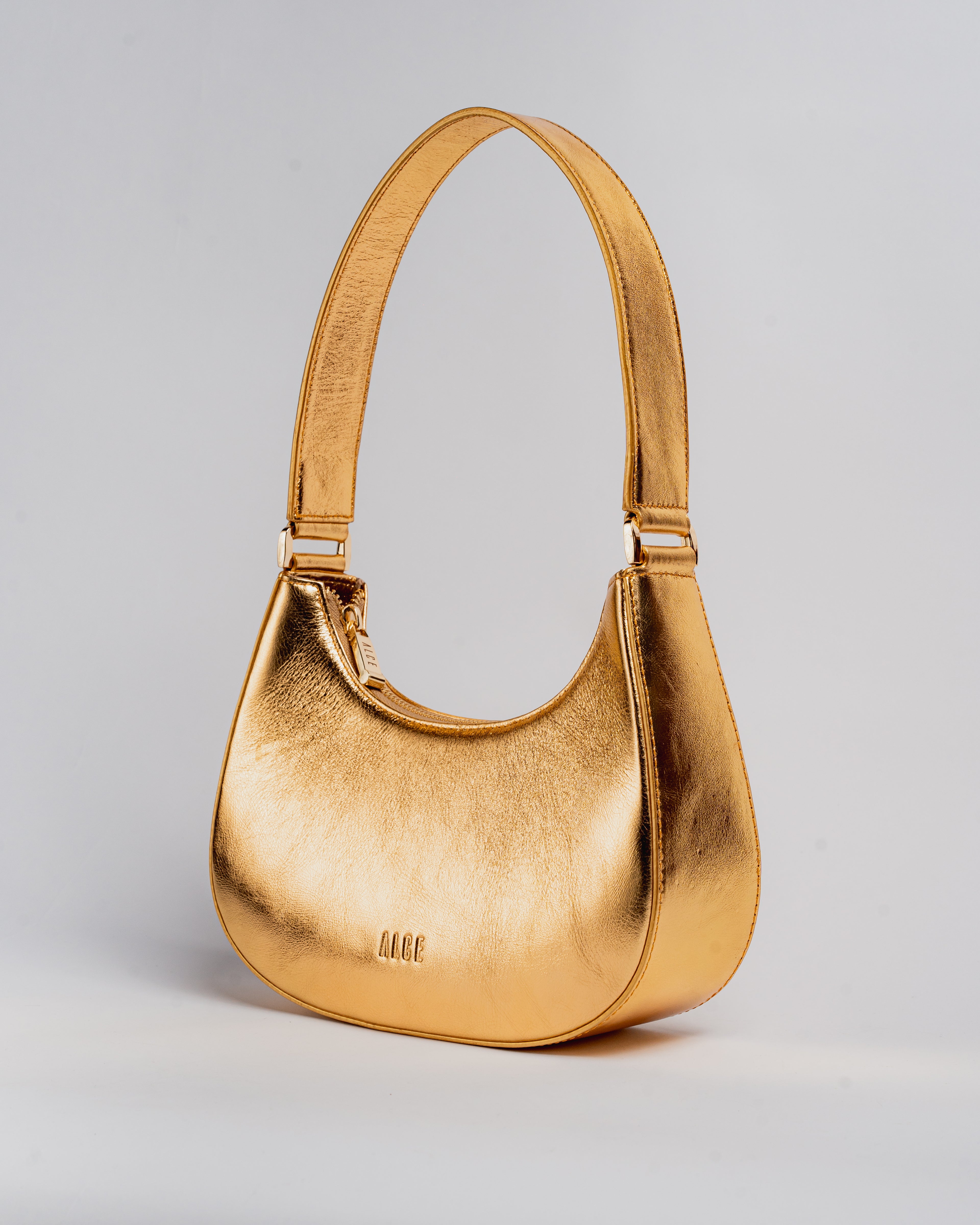MEDIA LUNA BAG DORADA