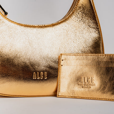 Bolso medialuna dorada