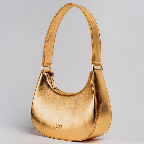 Bolso medialuna dorada