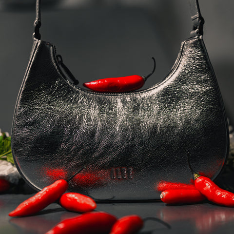 Bolso medialuna plateada
